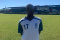Histórias dos Joguinhos Abertos de Santa Catarina: atleta haitiano disputa competição de futebol de campo por Joinville